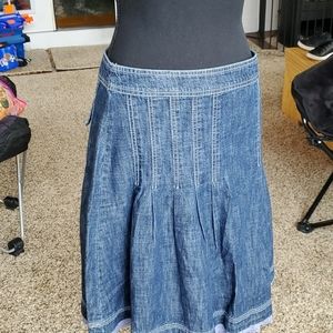 Cute denim skirt with eyelet detail at hem